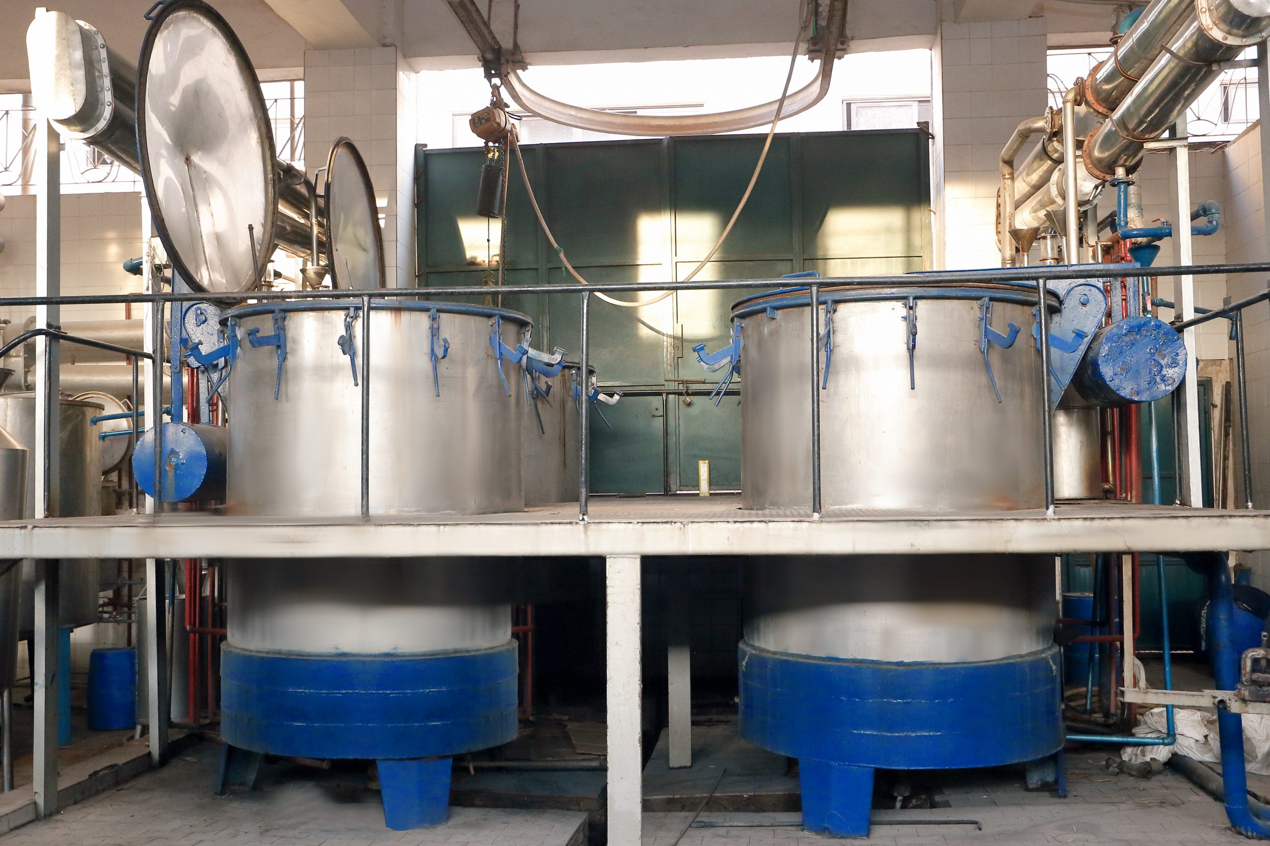 Polished stainless steel distillation stills at the Obour City facility