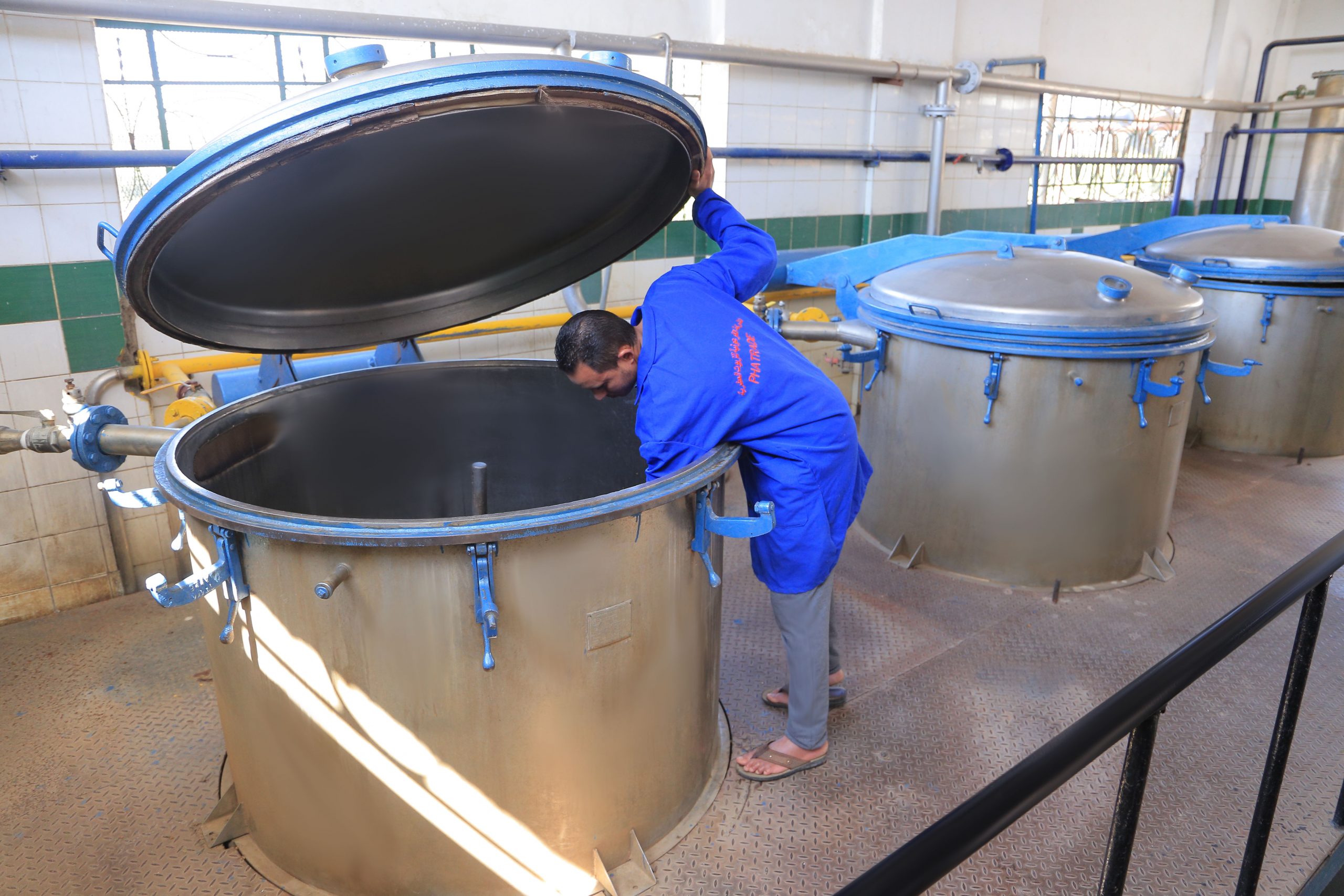 Large outdoor insulated distillation tanks at the Sadat City site