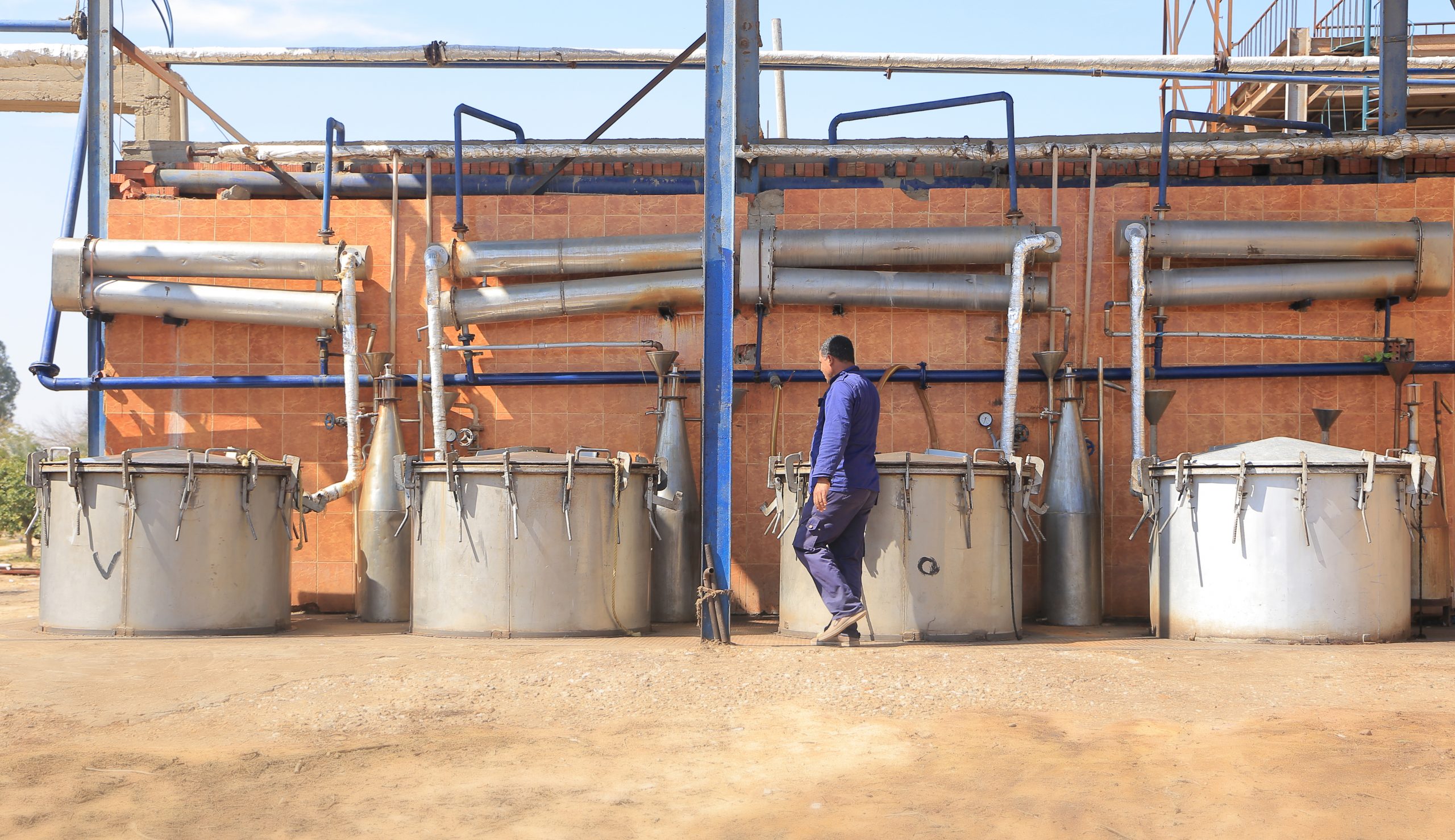 Distillation vessels under the concrete arches of the Sadat City facility