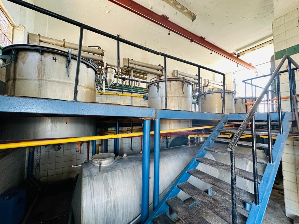 Large processing hall with multiple distillation columns at PHATRADE Obour City